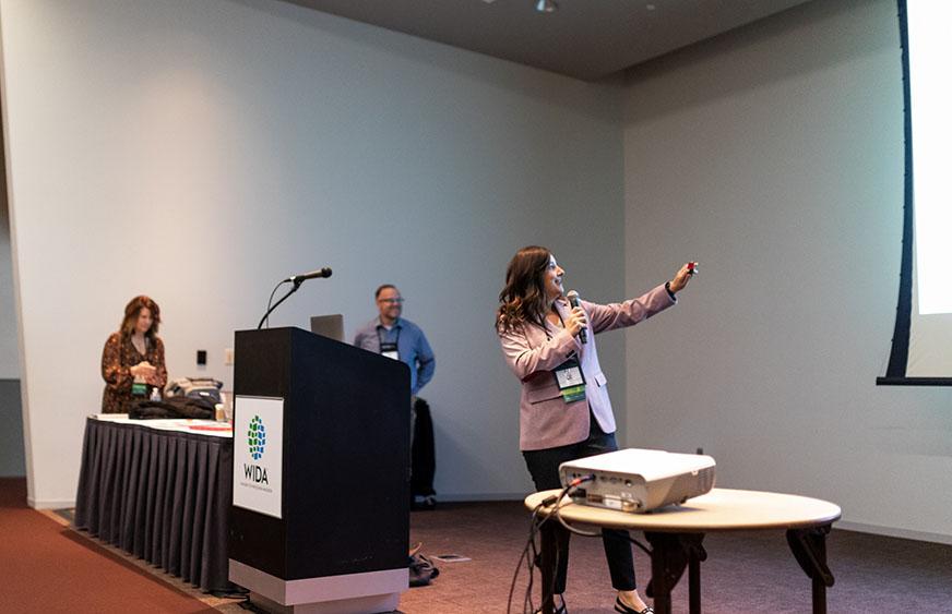 trio of presenters at front of a conference hall room at 2024 wida conference
