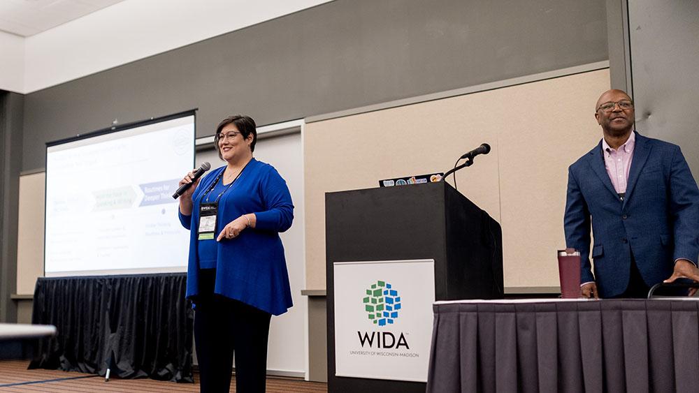 presenter speaking at front of conference hall room at 2024 wida conference