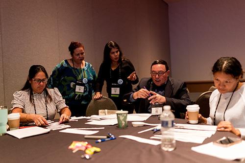 group of people collaborating around a table